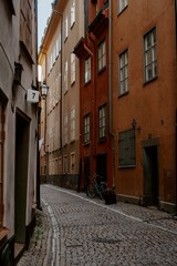 Vertical shot of Narrow colorful streets in Gamla Stan, Stockholm, Sweden