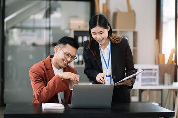 Business team present. professional investor working new start up project. Finance managers meeting.using smart phone and laptop and digital tablet computer in modern office.