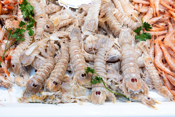 Fresh seafood delights at a bustling traditional market.