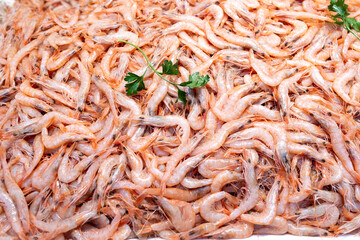 Fototapeta premium Fresh seafood delights at a bustling traditional market.