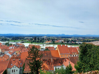 Fototapeta na wymiar panoramic view to Drava river and old center of town Ptuj. Slovenia