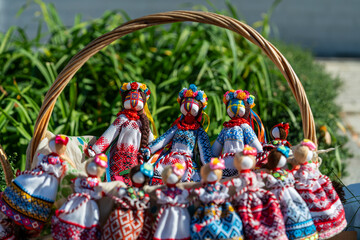 Close-up of a traditional amulet doll for sale to tourists at a street market, Kyiv, Ukraine. Ukrainian motanka dolls