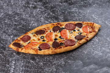 Flatbread with pepperoni and cheese, tomato, olives