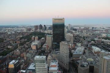 A view of Boston from the observation deck of the Prudential Tower. At the sunset