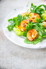 shrimp salad fresh arugula seafood shrimps meal food snack on the table copy space food background rustic top view 