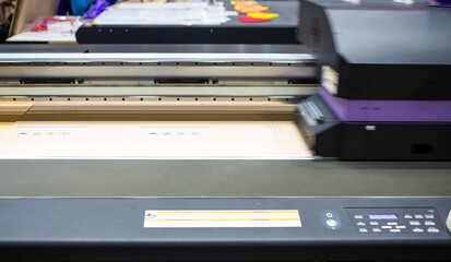 Flatbed UV LED Inkjet Printer. Cardboard packaging printing.