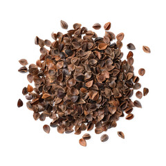 Heap of buckwheat hulls isolated on white background close up 