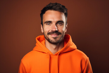 Obraz premium Handsome young man with clean fresh skin nice beard isolated on brown color background generative AI photography