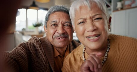 Senior couple, retired and video call as excited grandparents at home, chat and family. Retirement, virtual communications and social media app using smart device, happiness and technology savvy.