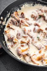 mushroom chanterelle julienne cream sauce meal food snack on the table copy space food background rustic top view 