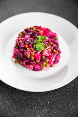 beet salad vegetable peas, carrots potatoes onions pickled cucumber meal food snack on the table copy space food background rustic top view