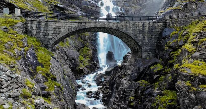 Landscape scene of Stone bridge near waterfall Stigfossen at  Trollstigen, Norway