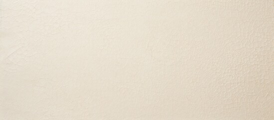 Fototapeta premium Light rough textured background with copy space featuring spotted white beige paper