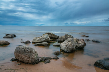 Stones covered with sea blanket