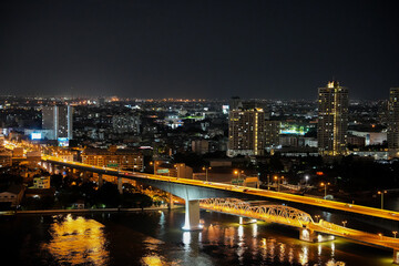 Fototapeta na wymiar The Chao Phraya River and the Cityscape of Bangkok in Thailand Asia
