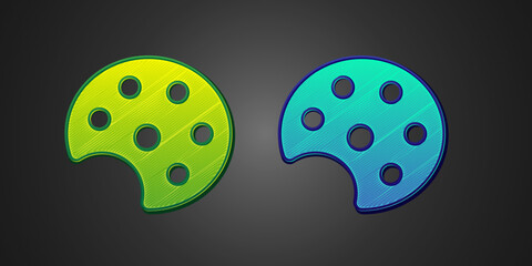 Green and blue Palette icon isolated on black background. Vector