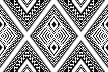 ikat and geometric seamless pattern. black and white ethnic oriental traditional background. Aztec style illustration design for carpet, wallpaper, clothing, wrapping, batik, and fabric.