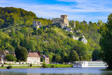 View of the River Seine in the Norman town of Les Andelys, overlooked by the ruins of Château...