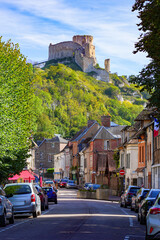 Fototapeta na wymiar Timbered houses in the Norman town of Les Andelys, overlooked by the ruins of Château Gaillard, a medieval castle built by the King of England Richard the Lionheart in Normandy, France