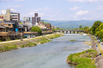 Fototapeta na wymiar Kamogawa river in Kyoto, Japan on May 1st, 2022