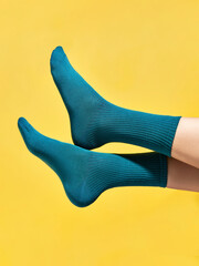 leg socks on yellow isolated background