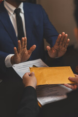 Lawyer or businessman is refusing and opposing the partner's bribery agreement in a joint financial...