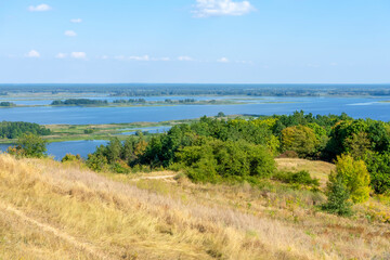 Fototapeta na wymiar Landscape of Dnieper river on sunny day near Vytachiv, Ukraine 