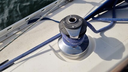 A sheet self-tailing winch on a sailing yacht