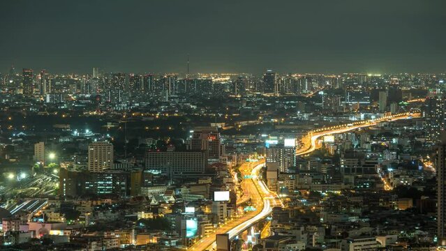 Bangkok city skyline night timelapse at city center and street highway, Thailand 4K time lapse