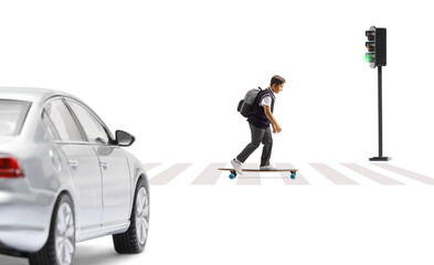 Full length profile shot of a schoolboy riding a skateboard at a pedestrian crossing