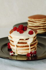 Pancakes with raspberries and cream