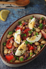 A bowl with Piyaz salad - traditional dish of Turkey