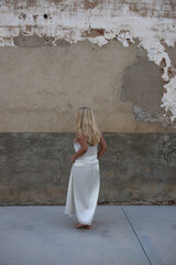 Fototapeta na wymiar young girl in a white wedding dress