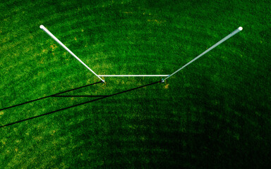 Aerial top down view of a freshly cut Rugby pitch and sole post