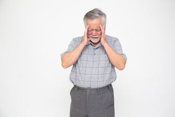 Asian senior man with a headache, dizziness or high blood pressure isolated on white background,...