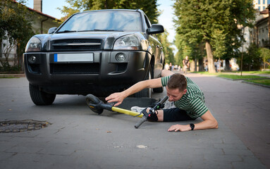 Man fell from an electric scooter and was injured. Active man broke his arm after falling from...