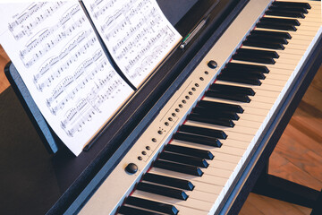 Mechanical piano keys with notes and a delicate, beautiful background