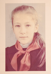 Old photo portrait of a pioneer school girl of the 80s of the USSR
