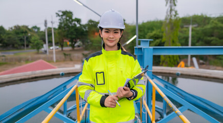 Environmental engineers work at wastewater treatment plants,Water supply engineering working at...
