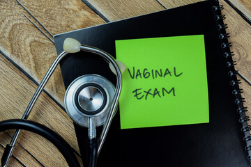 Concept of Vaginal Exam write on sticky notes with stethoscope isolated on Wooden Table.