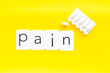 Word pain and rectal suppositories - medical treatment concept