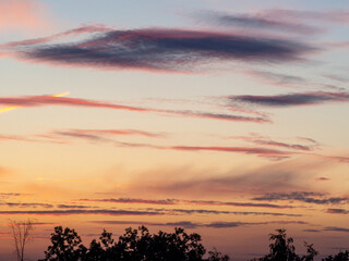 Sunset with beautiful cloudscape and landscape silhouette