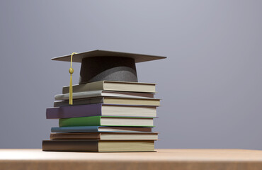Education concept, graduation cap, books, and graduation scroll. Congratulations graduates