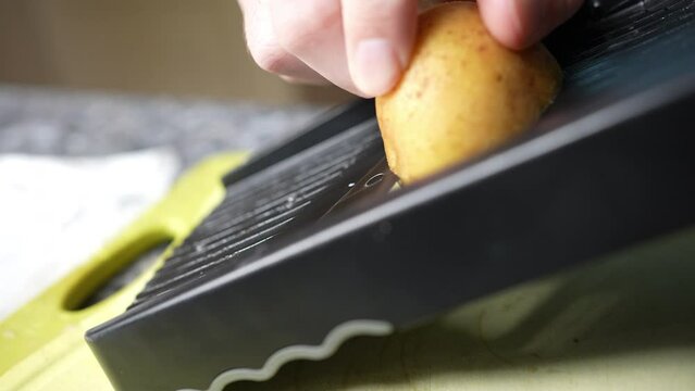 Amateur Chef Uses Mandoline Slicer To Slice Potatoes For Potato Gratin