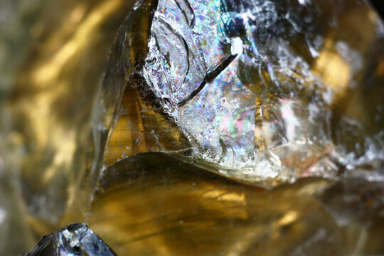 Composition fragment from pieces of glass of a free form. Abstract background, abstract picture.