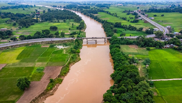 Aerial View of River and Bridge in Rural Nepal During Monsoon Season