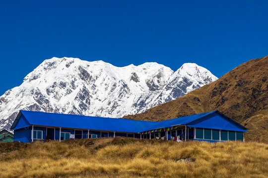 mountain hut with Annapurna mountain range in the backdrop