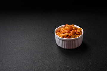 Delicious pickled honey mushrooms with salt and spices in a ceramic plate