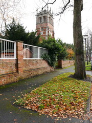 A charming brick building with a clock tower in Royal Leamington Spa, a historic spa town in England