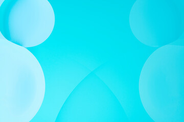 Macro photo with circles oil droplets water surface. Abstract blue background with oil bubbles.